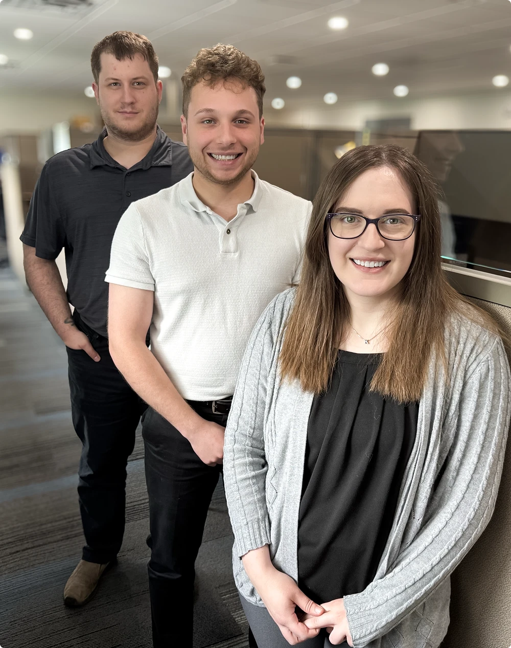 Three M.A. Polce team members in the office