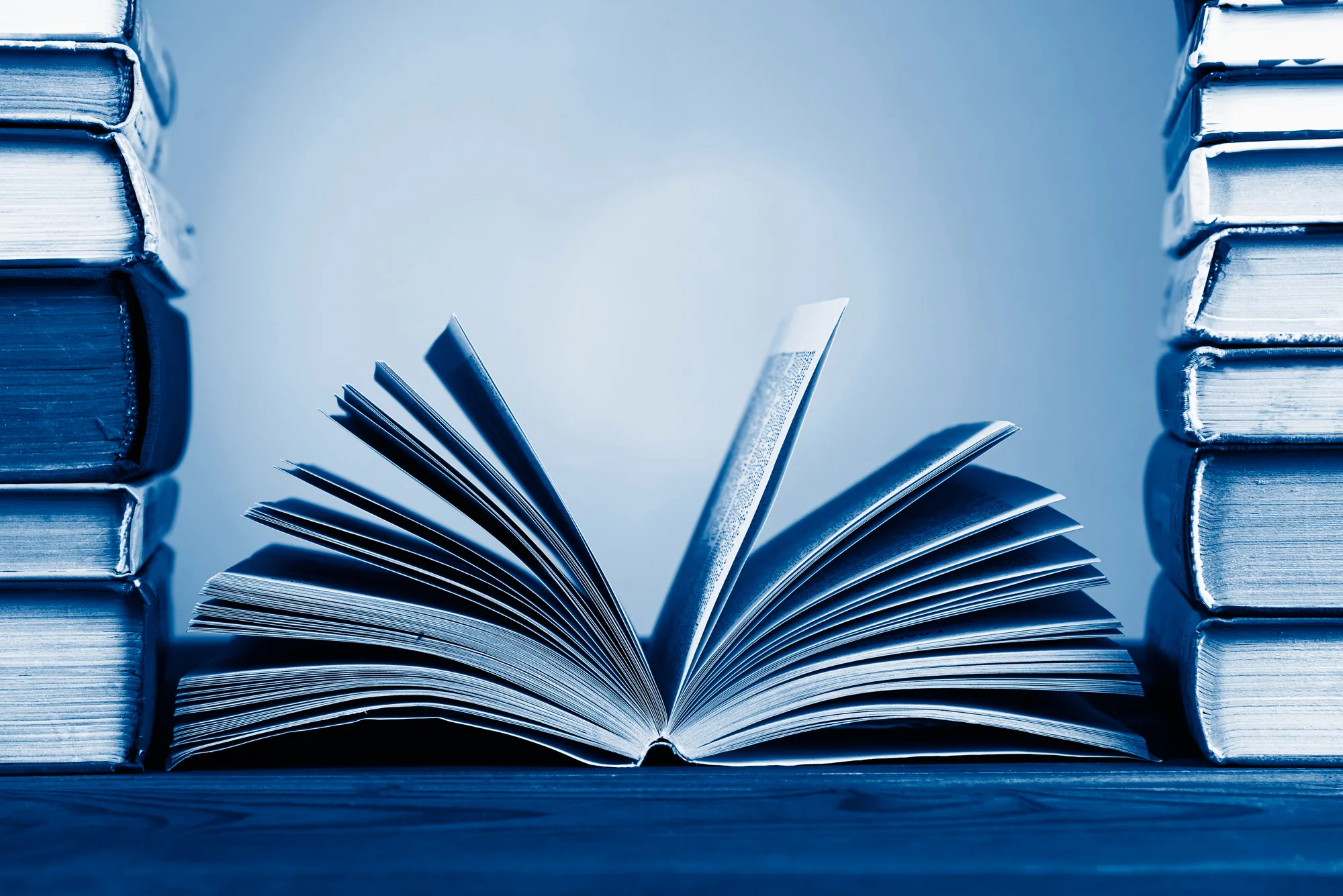An open book with its pages fanned upward