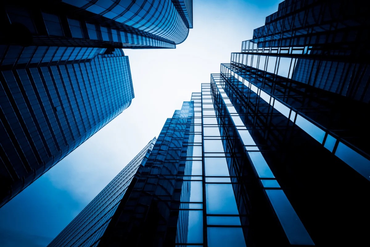 Looking up at glass residential towers
